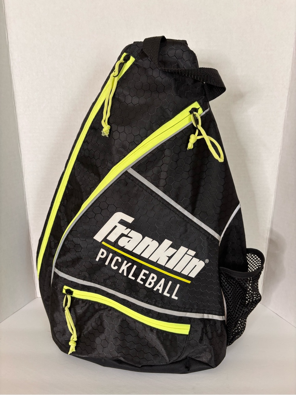 Franklin Pickleball Sling Backpack in Black with Neon Yellow Accents